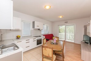 Apartment (A2) | Private kitchen | Fridge, oven, stovetop, dishwasher