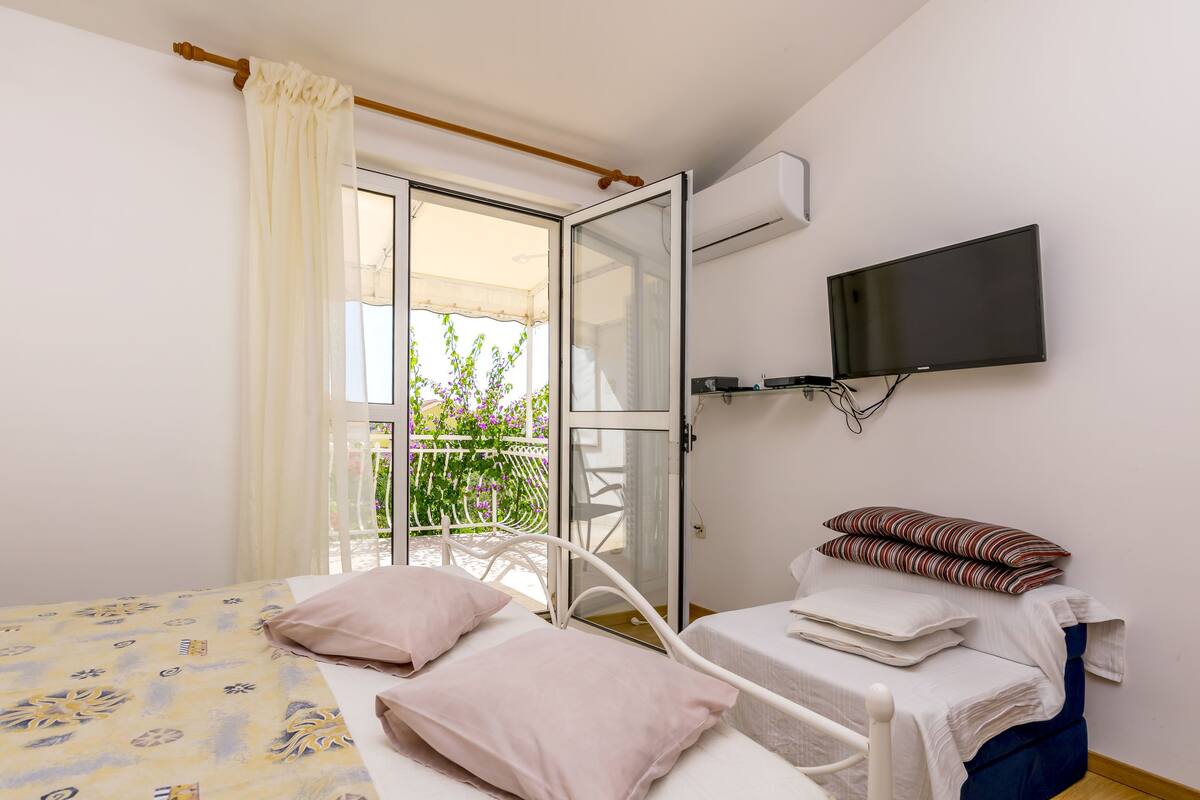 2 chambres, accès au Wi-Fi (inclus), literie fournie