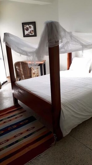 Individually decorated, desk, laptop workspace, blackout curtains - Njara Suites (Fort Portal)