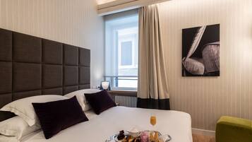 Premium bedding, down comforters, Select Comfort beds, minibar