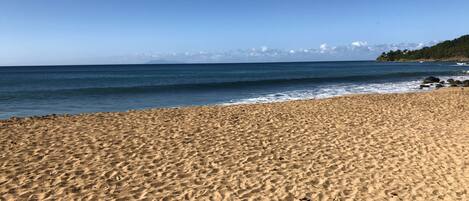 On the beach, sun loungers