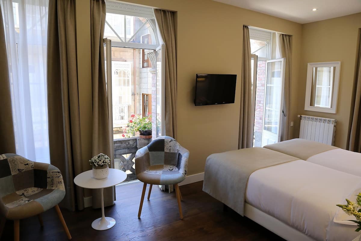 Blackout drapes, soundproofing, WiFi (free), bed sheets