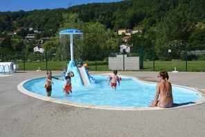Seasonal outdoor pool, pool umbrellas, pool loungers