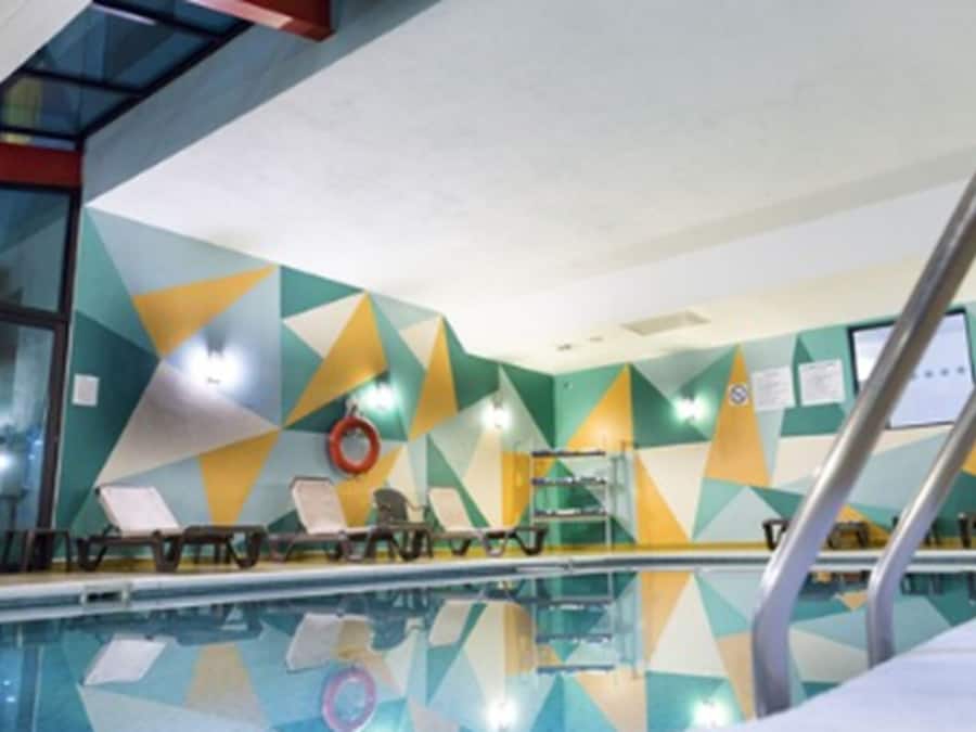 Indoor pool, open 8:00 AM to 9:00 PM, sun loungers