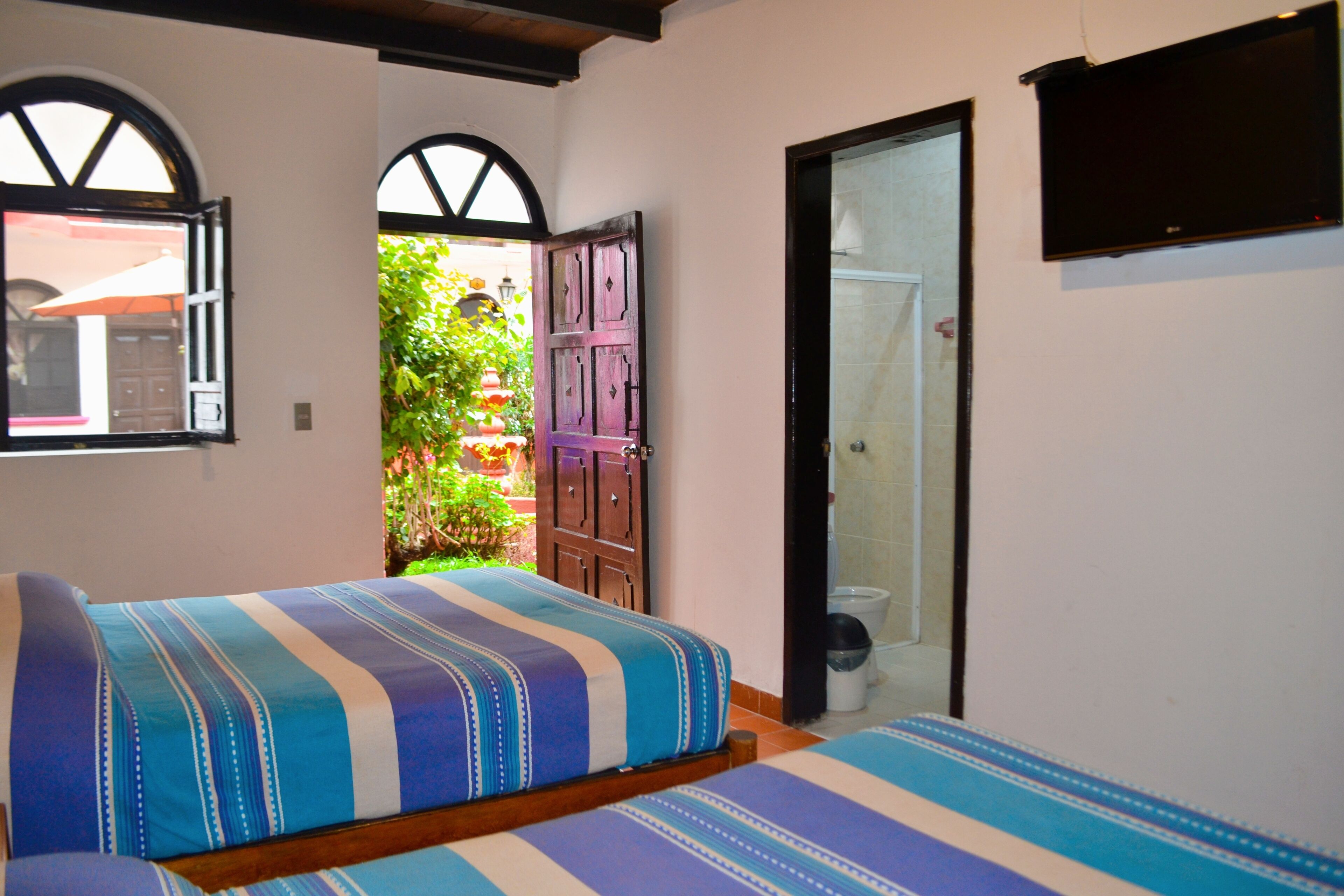 Quadruple Room | Hypo-allergenic bedding, blackout curtains, iron/ironing board