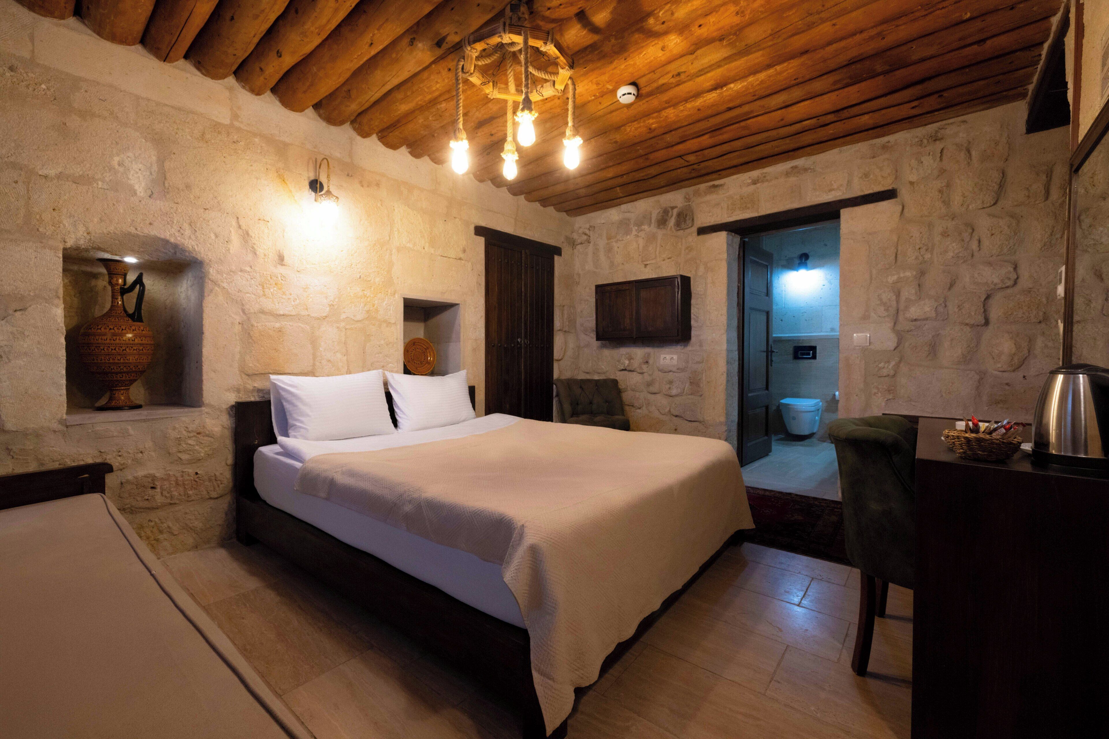 Deluxe tweepersoonskamer (Hezen Stone) | Een minibar, individueel gedecoreerd, gratis wifi, beddengoed