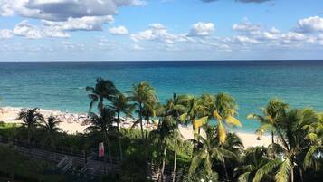 On the beach, sun loungers, beach towels