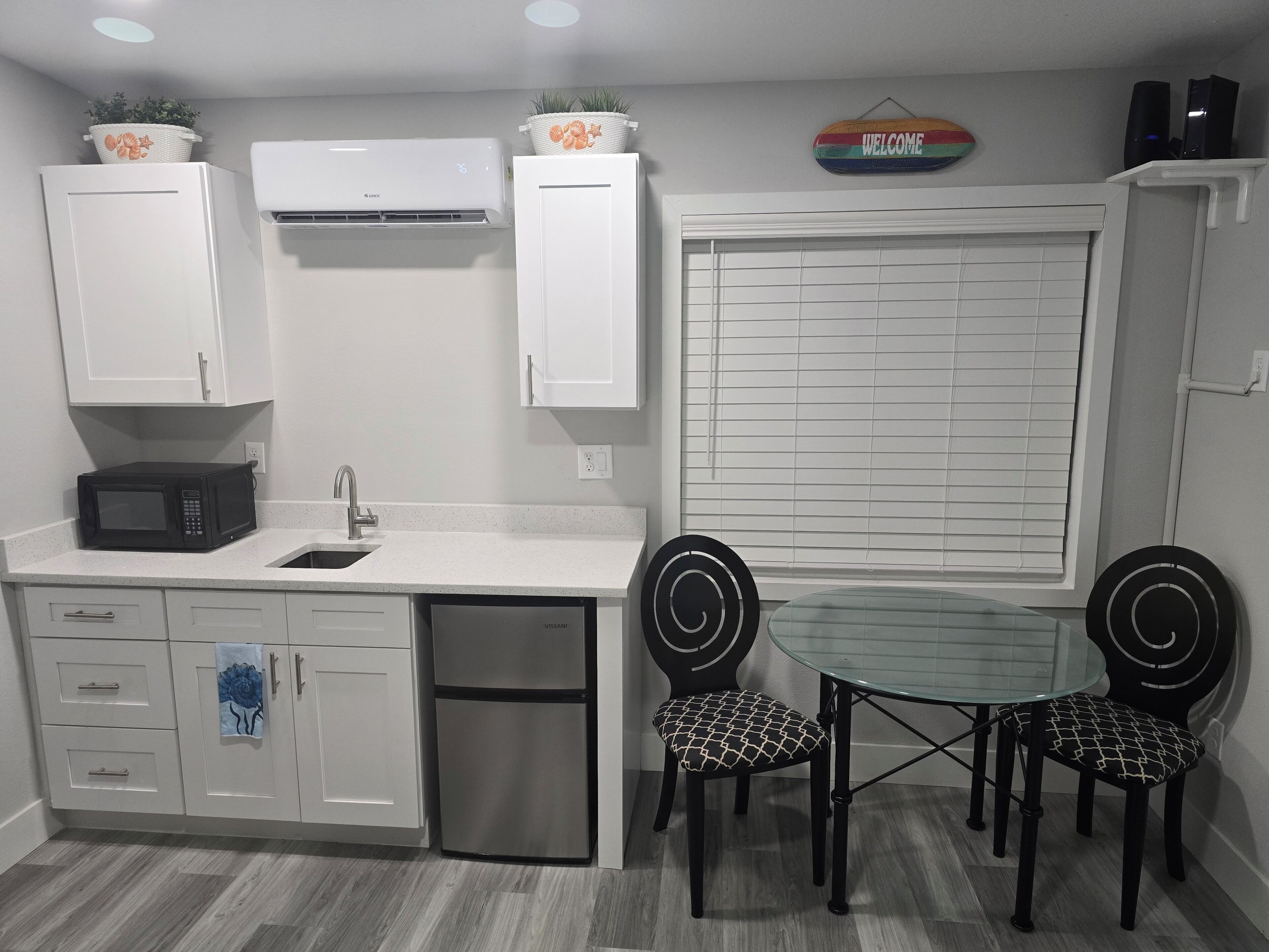 Fridge, microwave, coffee/tea maker, toaster