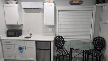 Fridge, microwave, coffee/tea maker, toaster