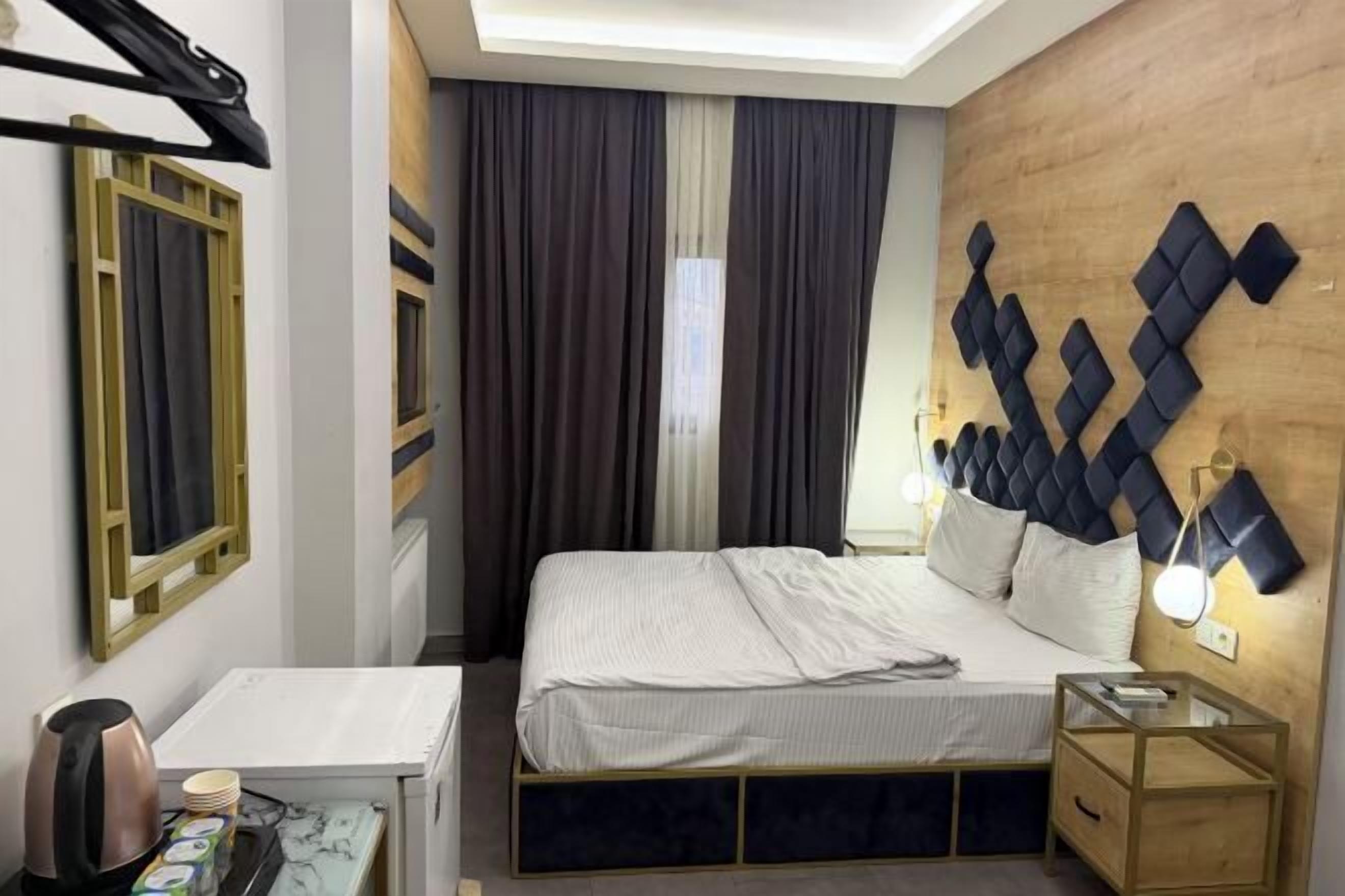 Minibar, una cassaforte in camera, ferro/asse da stiro, Wi-Fi gratuito