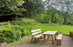 Outdoor dining - Romantic Log Cabin on Privately-Owned Lake with Fireplace (Stanfordville)