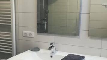 Shower, hair dryer, toilet paper