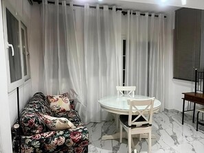 Suite Lune de Miel, 1 grand lit, vue océan, en front de plage | Coin séjour