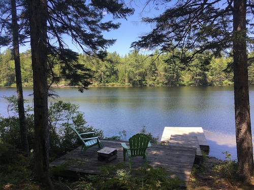 Secluded Lakefront, Dog-Friendly Cabin with Canoe, 7 Miles from the Ocean