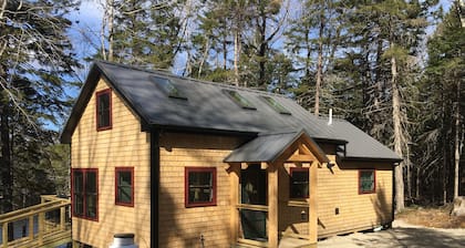 Secluded Lakefront, Dog-Friendly Cabin with Canoe, 7 Miles from the Ocean