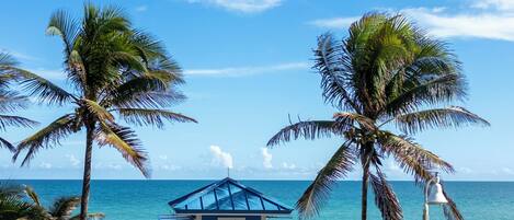 On the beach, sun loungers, beach towels