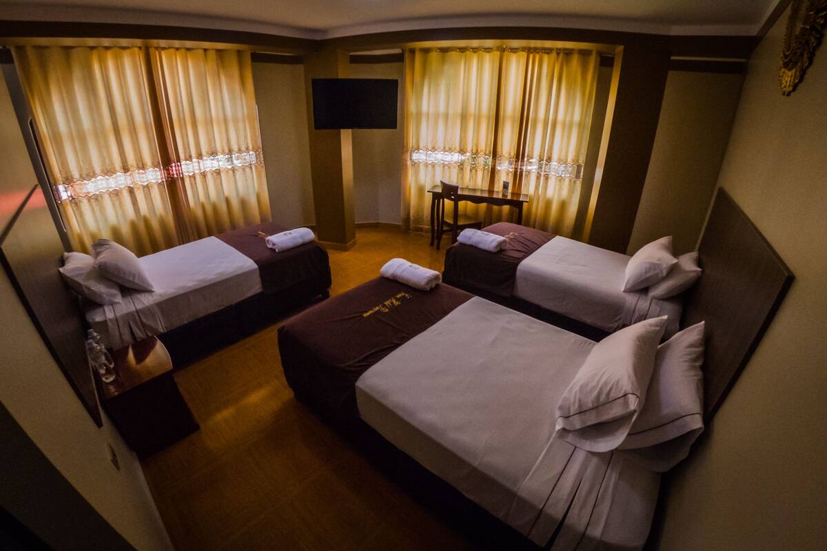 Comfort Triple Room | Living area | Smart TV