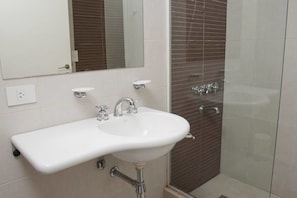 Design Apartment, 1 Bedroom | Bathroom | Shower, designer toiletries, hair dryer, slippers