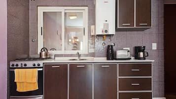 Design Apartment, 1 Bedroom | Private kitchen | Full-size fridge, microwave, oven, stovetop