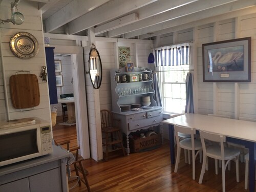 Escape to Costal Comfort. Step Back In Time at this Waterfront Retreat!