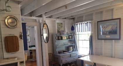 Escape to Costal Comfort. Step Back In Time at this Waterfront Retreat!