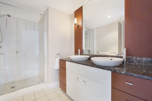 Combined shower/tub, hair dryer, towels, soap