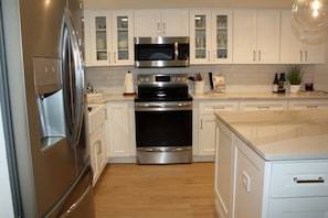 Microwave, dishwasher, coffee/tea maker, ice maker