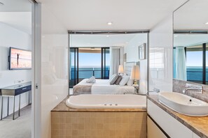 Shower, jetted bath, hair dryer, towels