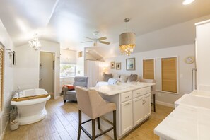 Bathtub, hair dryer, towels, soap
