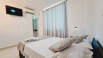 1 habitación, cortinas blackout, wifi gratis y ropa de cama