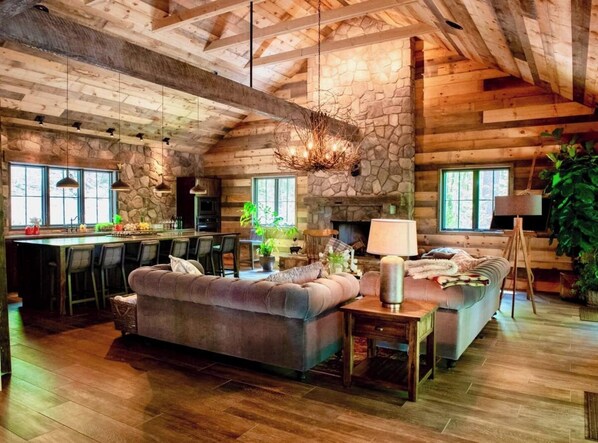 TV, fireplace - A stunning, modern Lodge with rustic charm at June Farms! (West Sand Lake)