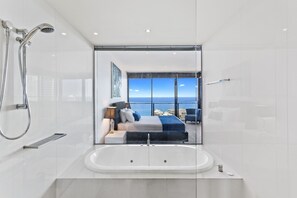 Shower, jetted bath, hair dryer, towels