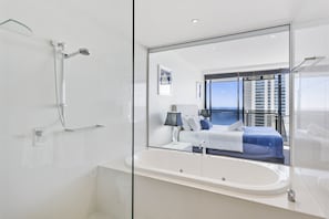 Shower, jetted tub, hair dryer, towels
