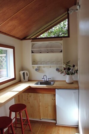 Fridge, microwave, coffee/tea maker, toaster