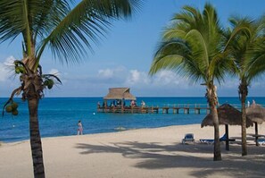 On the beach, sun-loungers, beach towels