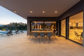 Outdoor dining - Stylish Villa Quadra***** with a sea view and heated pool on Krk (Pinezici)