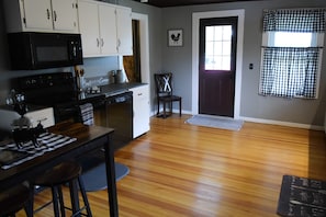 Fridge, microwave, oven, stovetop - "Just an Old Farm House" is a comfortable and cozy country house. (West Winfield)