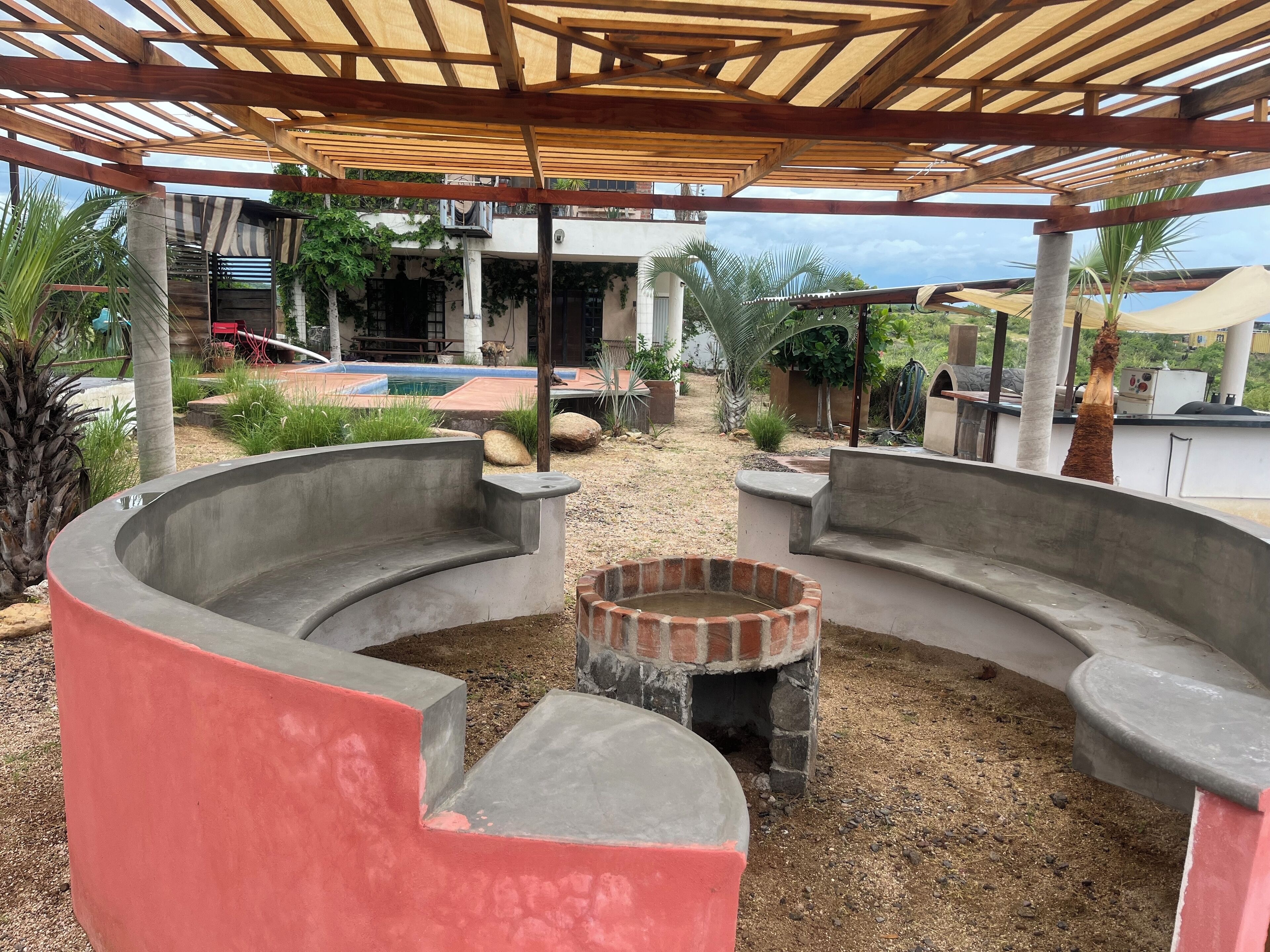 Backyard seating area with gas fire pit