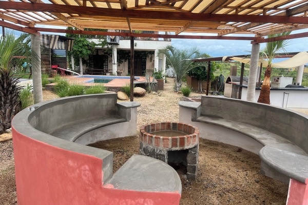 Backyard seating area with gas fire pit