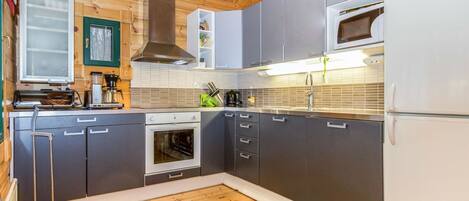 Fridge, microwave, dishwasher, cookware/dishes/utensils