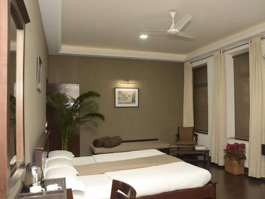 Luxury Double Room | Living area | 40-inch LED TV with digital channels