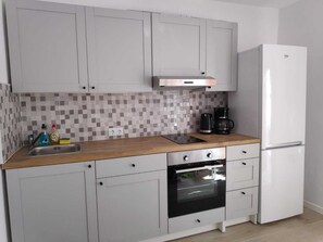 Refrigerador, microondas, horno, placa de cocina