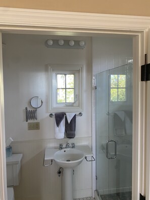Shower, hair dryer, towels, soap