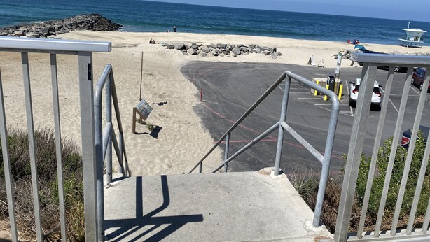 A beachside parking area with a view of the ocean. - Coastal Studio Retreat!! WALK TO SURF & SAND or 1 MIN DRIVE!!! GREAT LOCATION!!! (Carlsbad)