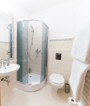 Shower, free toiletries, hair dryer, towels