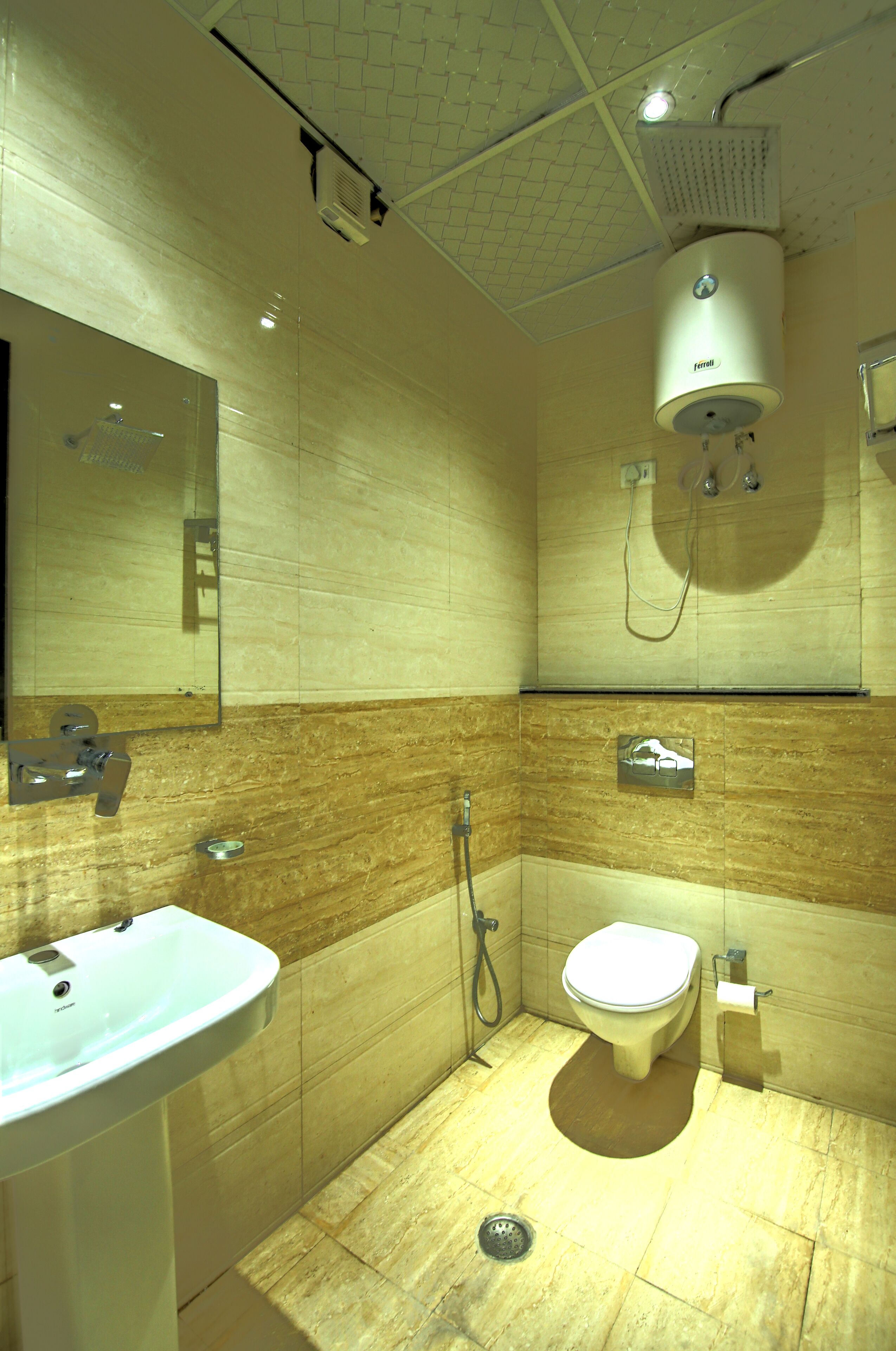 deluxe room with airport drop | bathroom | shower, hydromassage showerhead, free toiletries, hair dryer