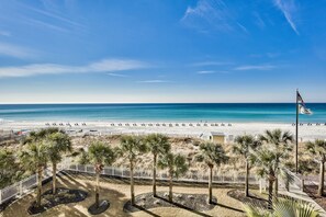 On the beach, sun loungers, beach towels