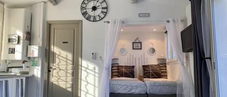 1 dormitori, planxa i posts de planxar, wifi gratuïta i roba de llit