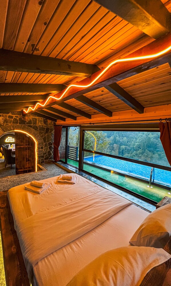 LUXURY STONE HOUSE | Minibar, desk, laptop workspace, blackout curtains