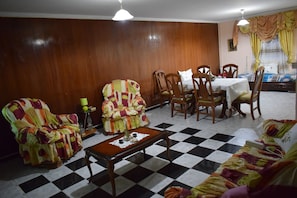 Family House, 2 Bedrooms | Living area | 34-inch flat-screen TV with satellite channels, TV